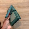 naila purse green