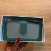 naila purse green