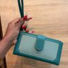 naila purse green